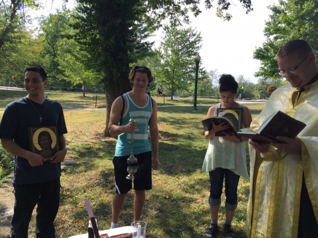 Students take turns reading the Scriptures